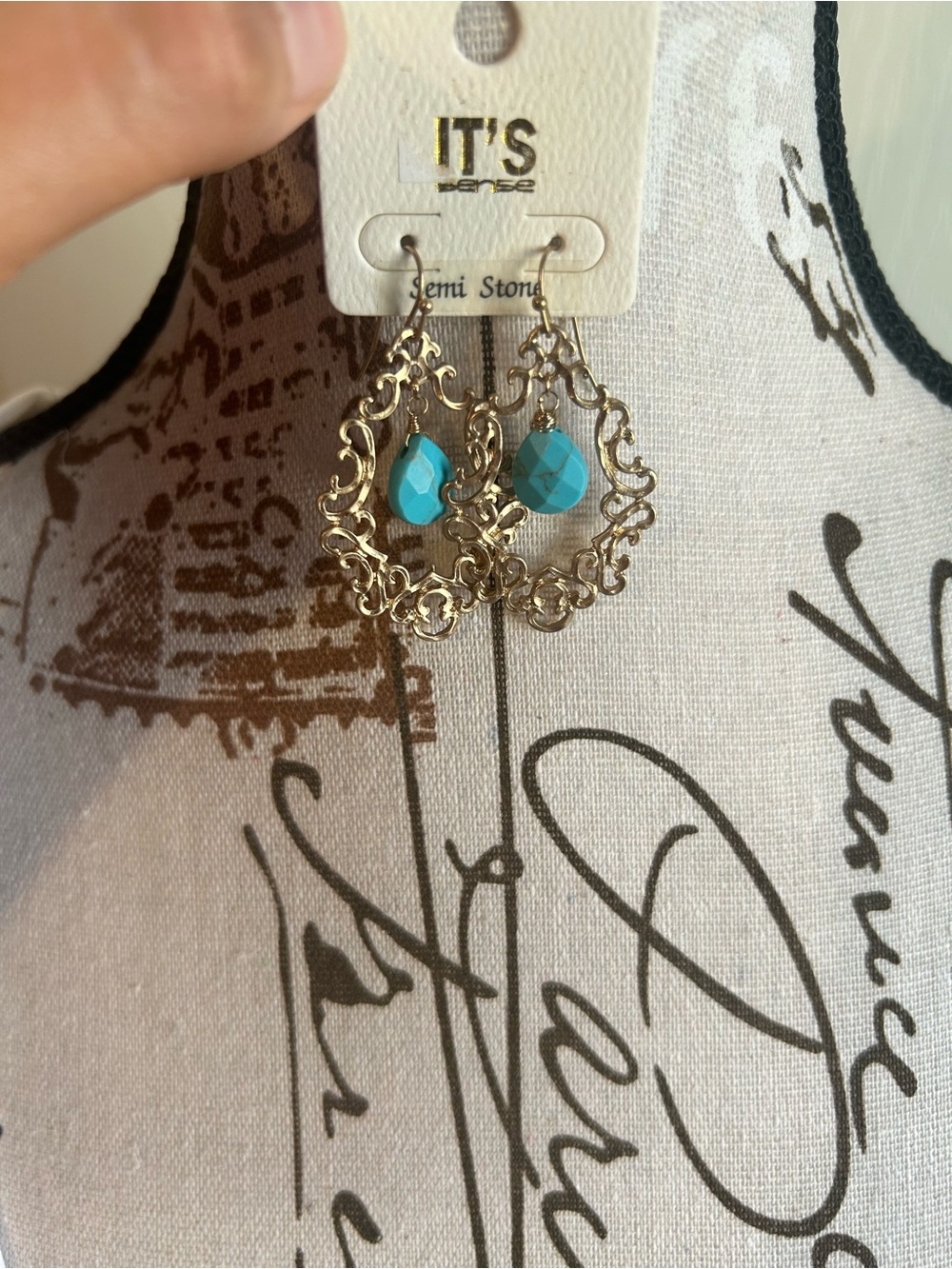 Elegant earrings with faux turquoise bead